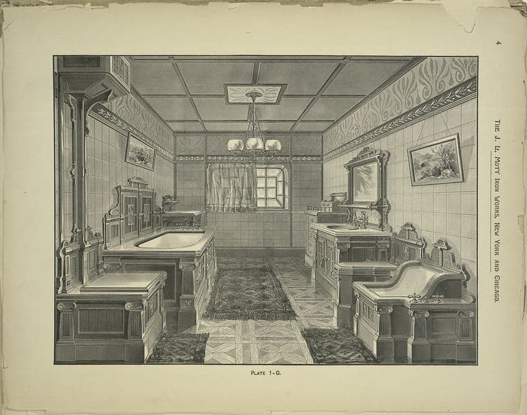 Salle de bain rénovée avec robinetterie moderne et finitions soignées
